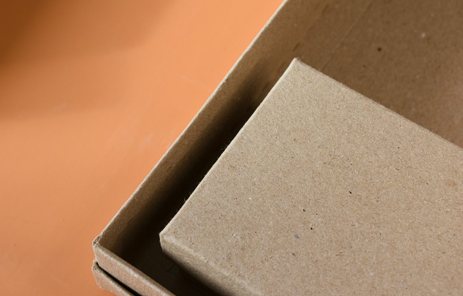 an open cardboard box sitting on top of a table