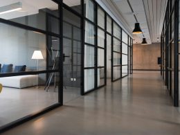 hallway between glass-panel doors