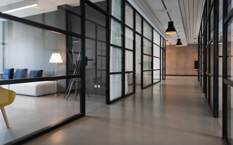 hallway between glass-panel doors