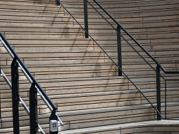 a man walking down a flight of stairs