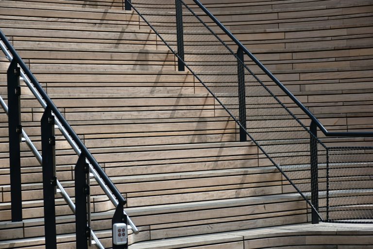 a man walking down a flight of stairs