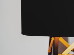 black table lamp on brown wooden table