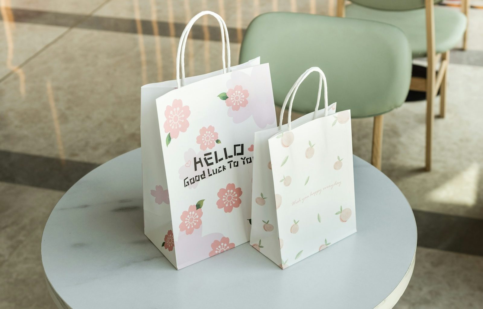 a couple of shopping bags on a table