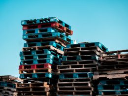 a pile of wooden pallets stacked on top of each other