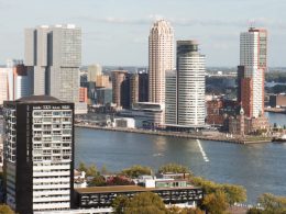 city skyline near body of water during daytime