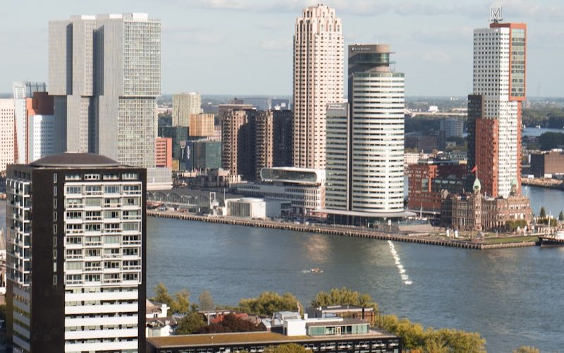 city skyline near body of water during daytime