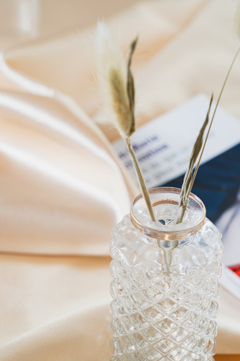 clear glass jar with silver spoon