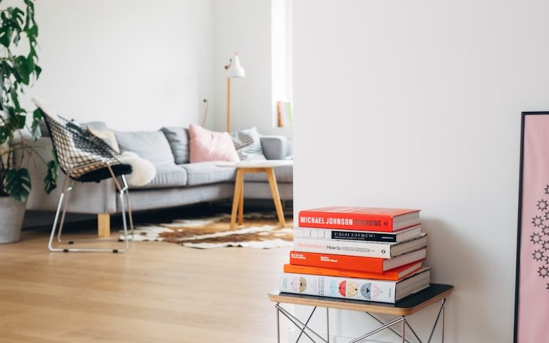 books on brown wooden stool