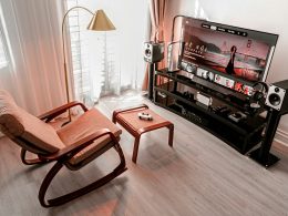 a chair and a television in a living room