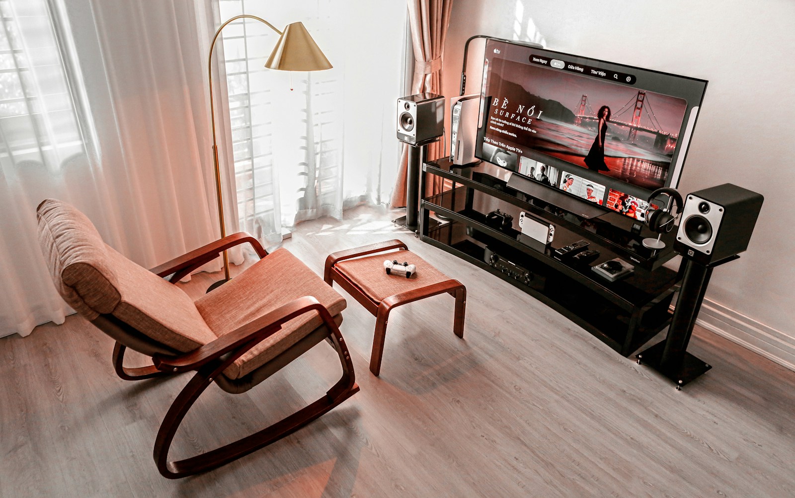 a chair and a television in a living room